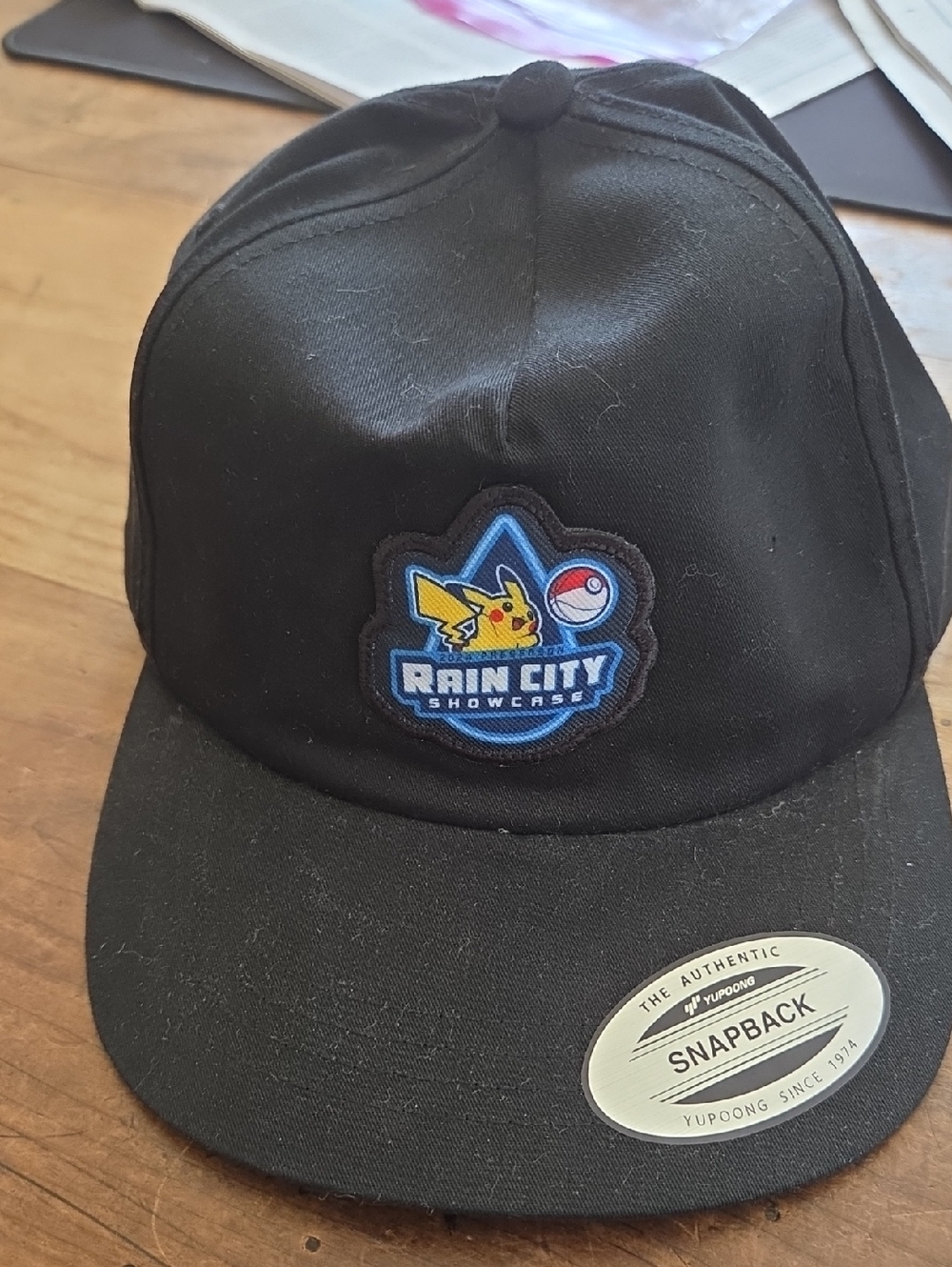 Rain City Showcase Pikachu Snapback Baseball Cap - Black with Blue Patch
